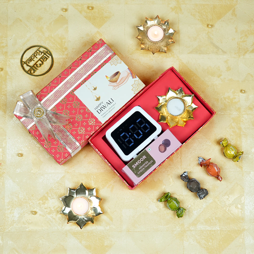 Smart Diwali Gifts Hamper - Bluetooth Alarm Clock & Chocolates Smart Diwali Gifts Hamper - Bluetooth Alarm Clock & Chocolates